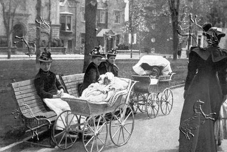 Woman with their perambulators taking babies out for some fresh air.