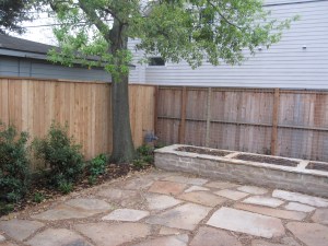 The new fence adds more privacy from the neighboring house. 