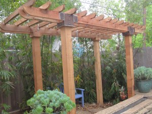 Pergola with welded brackets