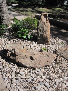 The rocks and boulders make a fun visual treat for people walking by while letting the ground remain totally water permeable so the trees can get as much water as possible. 