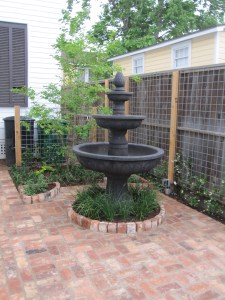 Note the trash cans, in a year they will be hidden behind a green wall. 