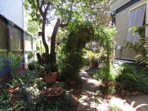 The path leads you through arches and under trees.