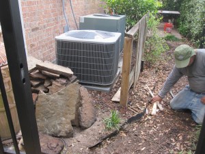 Cedar gate and A/C surround. Designed and constructed by Ravenscourt Landscaping & Design LLC