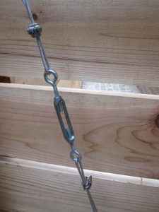 Cedar gate and A/C surround. Designed and constructed by Ravenscourt Landscaping & Design LLC