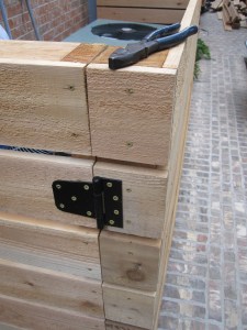 Cedar gate and A/C surround. Designed and constructed by Ravenscourt Landscaping & Design LLC