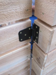 Cedar gate and A/C surround. Designed and constructed by Ravenscourt Landscaping & Design LLC