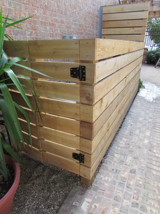 Cedar gate and A/C surround.