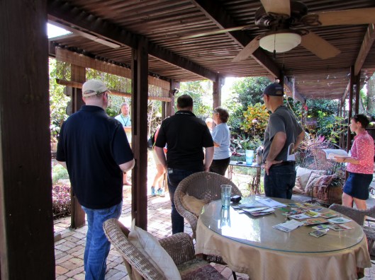 Just off the house is a lovely covered patio where Debra often sits to work. 