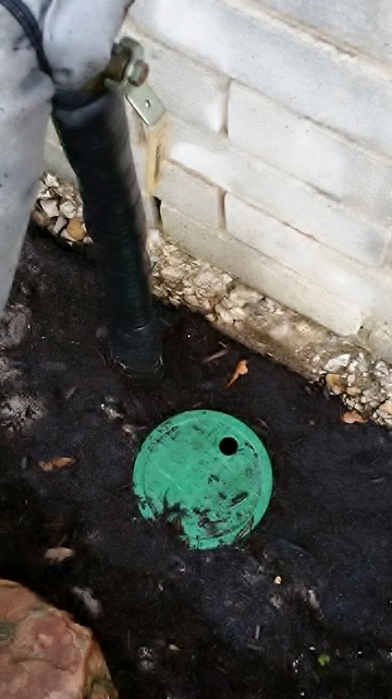 Next locate the cut off valve. This would have been installed on any irrigation systems within the past 5 years (in theory). It will be located between the service line (where the water goes into your house) and the backflow device.