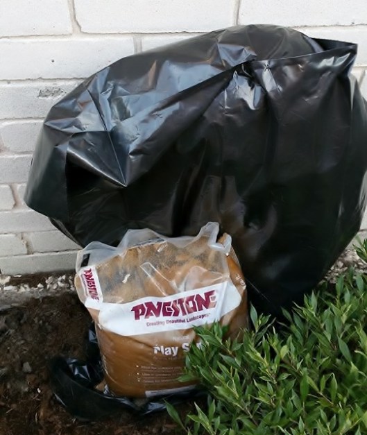 And be sure to weigh the bag down in some way. At this property the owner had a bag of sand! Garden Gnomes and rocks work well also.