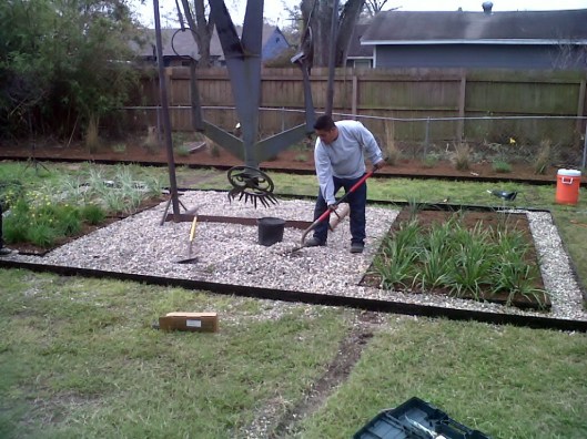 In the back ground you can see the one gallon newly planted Maiden Grass.