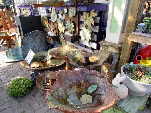 Wandering back to pay we saw these beautiful bird baths and wall art from a Texas artist.