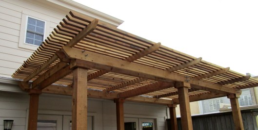 You can see how the bolts are just next to the gutters. The client asked to have the pergola as close to the house as possible while still allowing for maintenance. I could have gotten, maybe, a quarter of an inch closer.