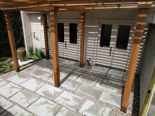 Cement pad and gravel patio.
