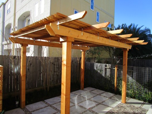Touring town house just build behind this little yard. 